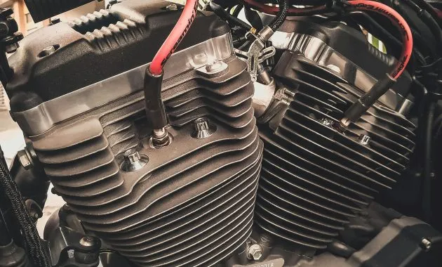 Detailed view of a motorcycle engine showcasing intricate mechanical parts and design.